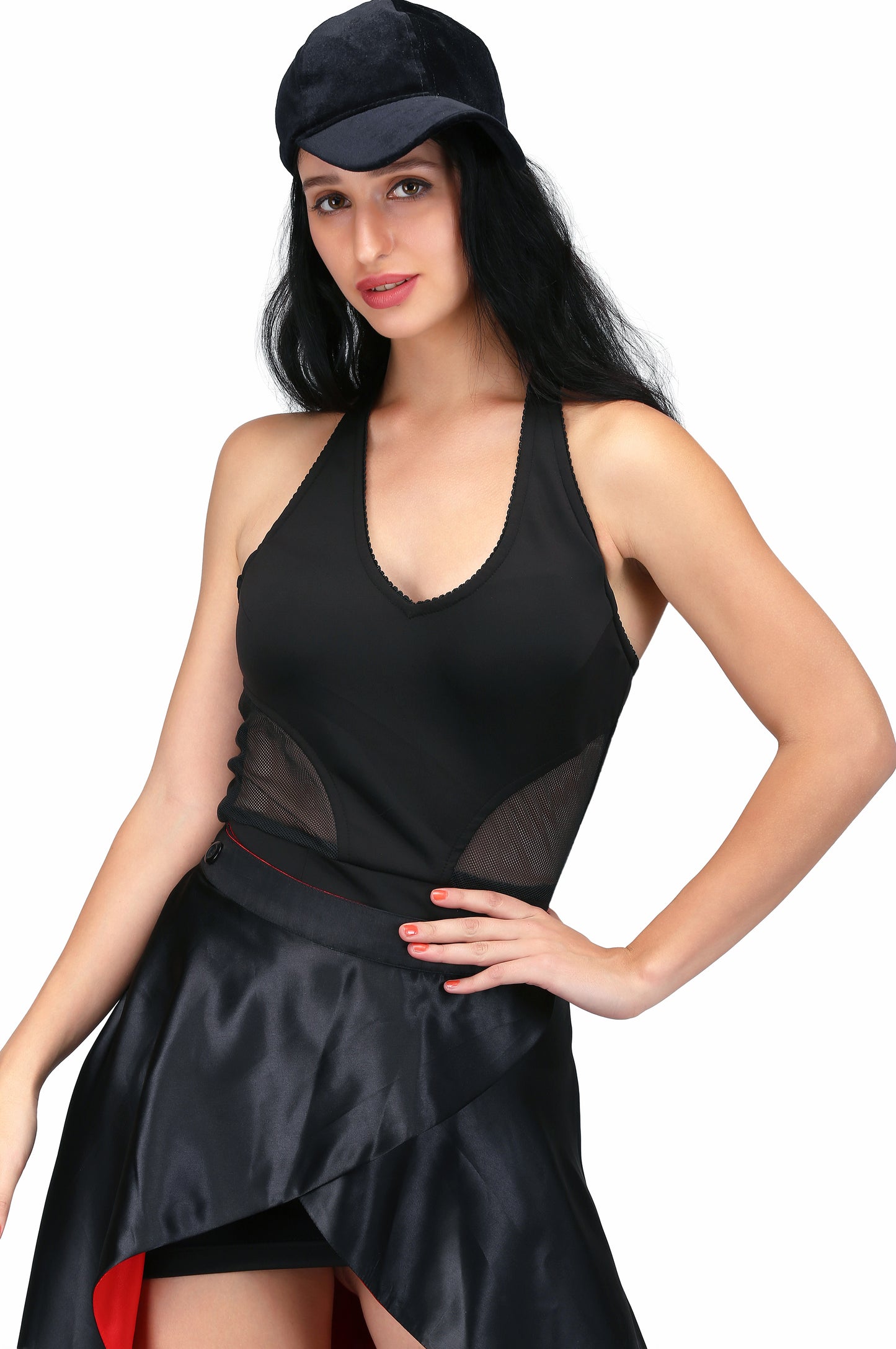long reversible and overlaped skirt in red and black fabric combined with the black fitted dress