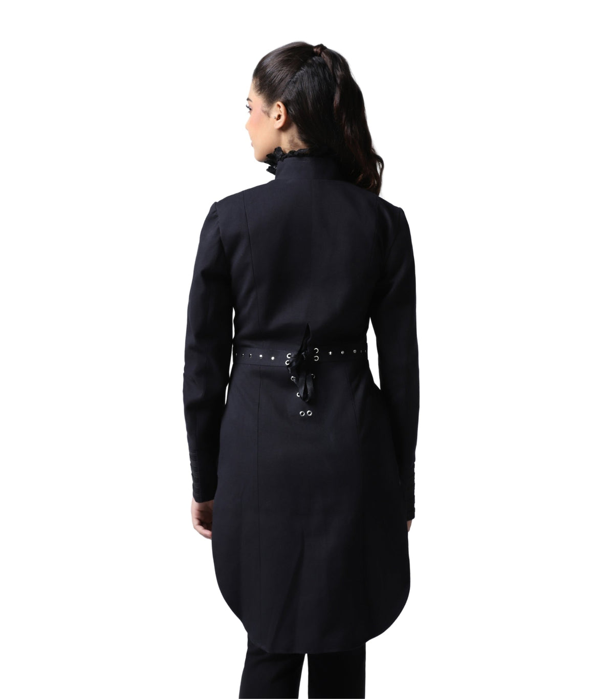 A woman shown from the back wearing a long black coat with a matching black belt and silver-tone studs, photographed against a plain white studio background.