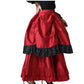 Side view of a model wearing a red and black ruffled high-low Steampunk bustle skirt with an ivory peasant blouse.
