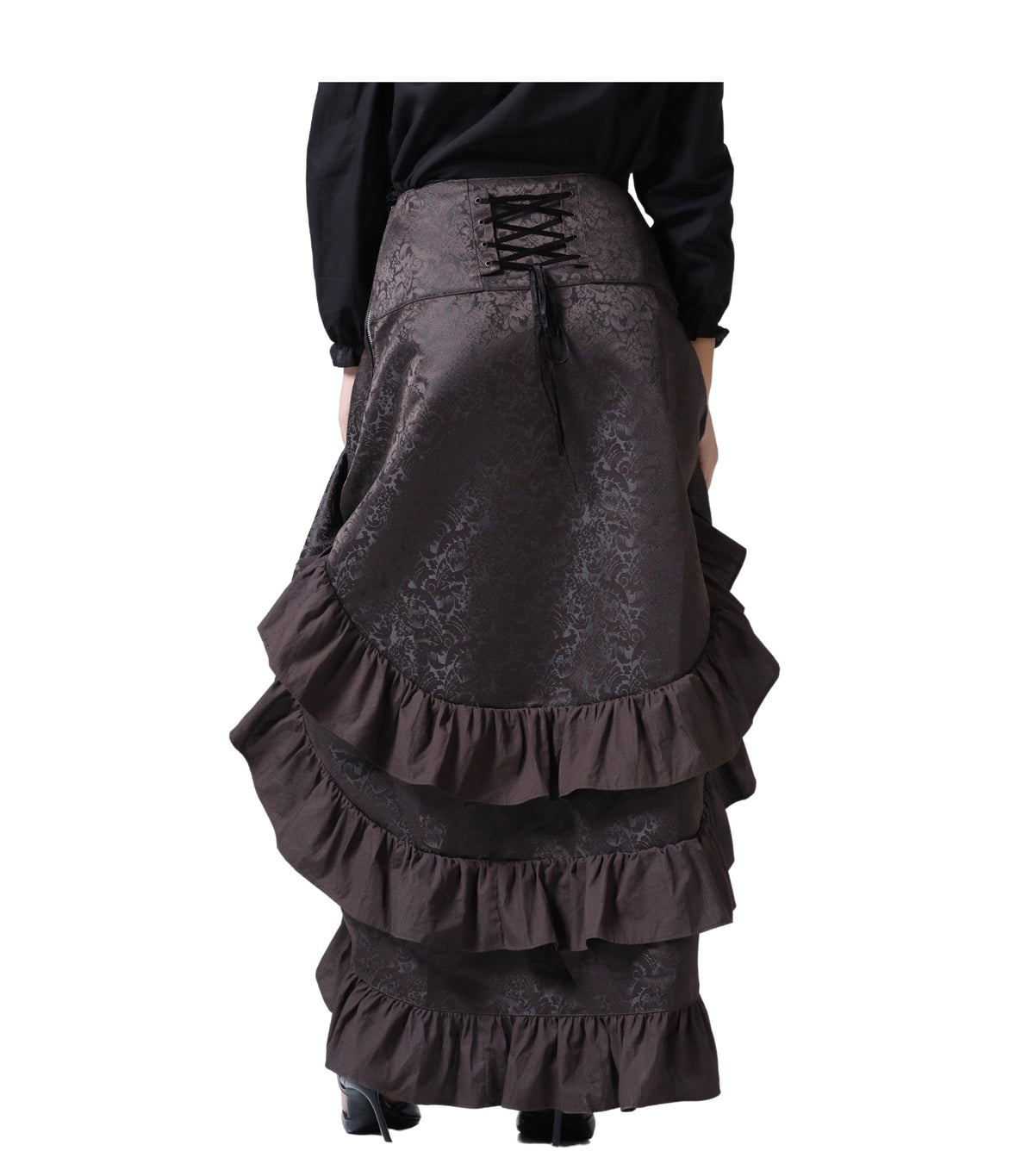 A dark brown ruffled skirt with a subtle damask pattern, featuring a lace-up back waistband, shown on a model from the back against a white background.
