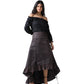 A woman modeling a black off-the-shoulder long-sleeve blouse paired with a dark brown high-low satin skirt with ruffle details, set against a plain white background.