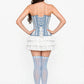 Back view of light blue denim and mesh corset with white criss-cross lacing and metal eyelets.