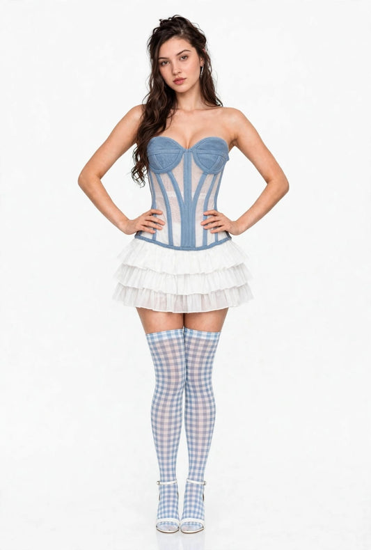 model wearing denim mesh corset on whtite skirt